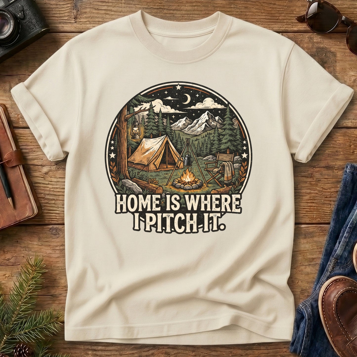 Pitch It Tee – tent, lantern, and campfire night sky badge graphic on Comfort Colors 1717 tee, flat lay