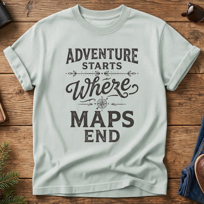 Adventure Starts Where The Maps End Tee – bold typography compass rose graphic on Comfort Colors 1717 tee, flat lay