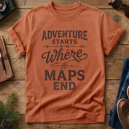 Adventure Starts Where The Maps End Tee – bold typography compass rose graphic on Comfort Colors 1717 tee, flat lay