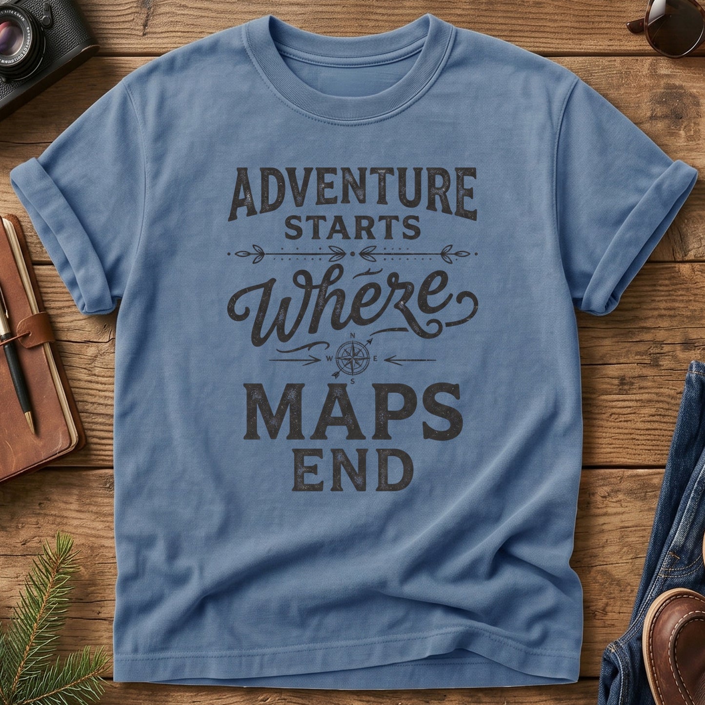 Adventure Starts Where The Maps End Tee – bold typography compass rose graphic on Comfort Colors 1717 tee, flat lay