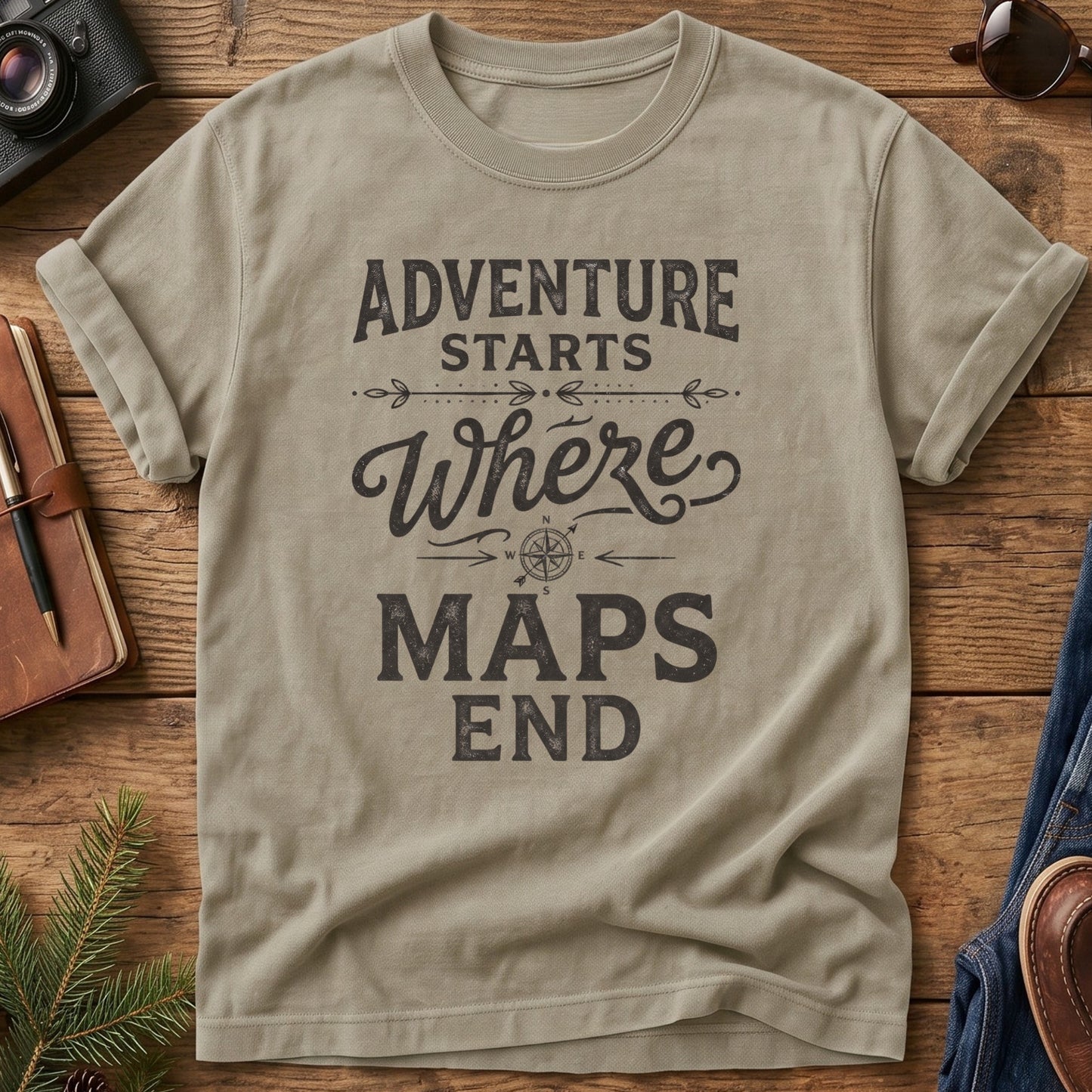 Adventure Starts Where The Maps End Tee – bold typography compass rose graphic on Comfort Colors 1717 tee, flat lay