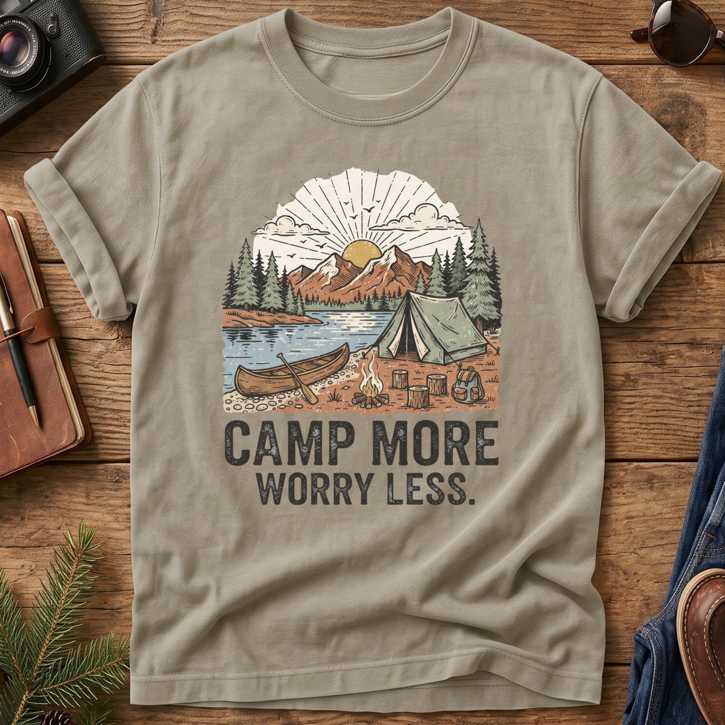 Camp More Worry Less Tee – styled flat lay, lakeside campsite graphic