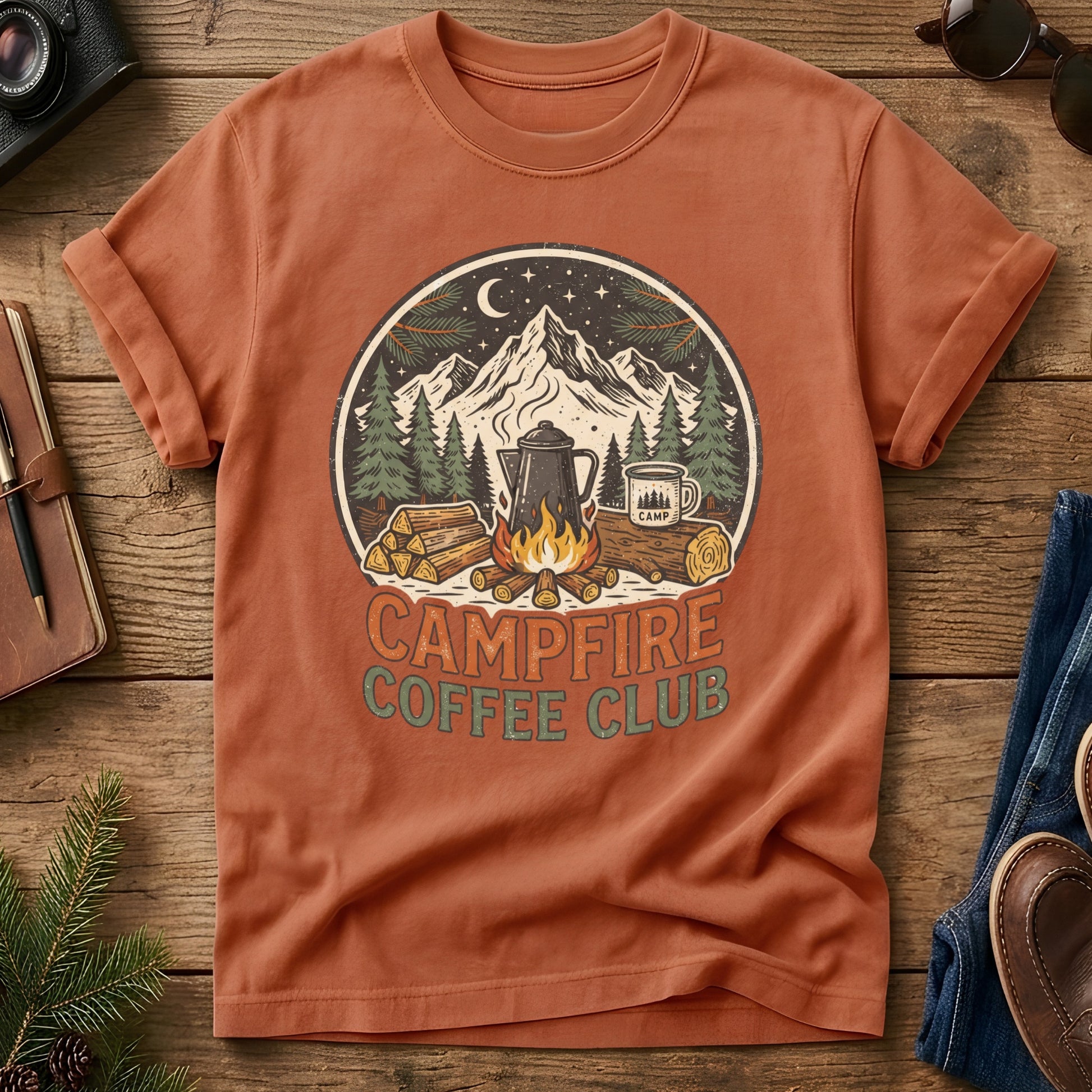 Campfire Coffee Club Tee – styled flat lay, camp coffee badge graphic