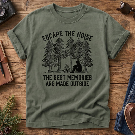 Escape The Noise Tee in Moss — campfire and pine tree graphic