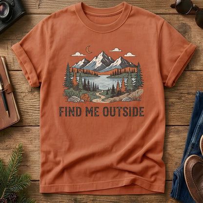 Find Me Outside Tee – moonlit mountain lake and forest trail graphic on Comfort Colors 1717 tee, flat lay