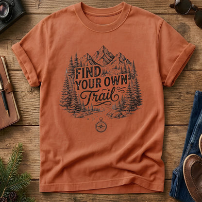 Find Your Own Trail Tee – compass and forest mountain trail graphic on Comfort Colors 1717 tee, flat lay