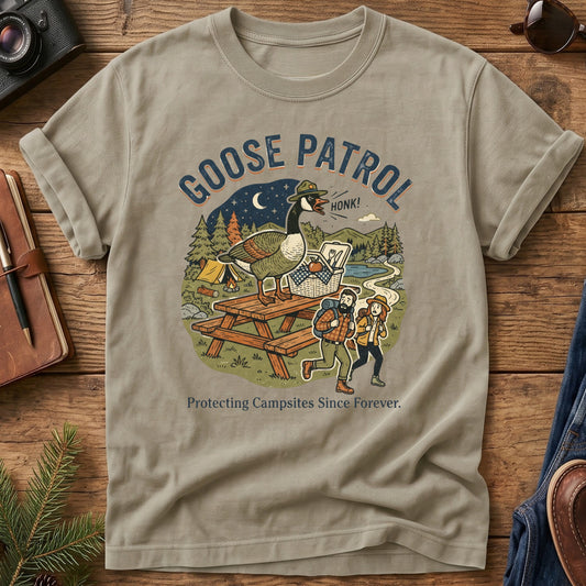 Goose Patrol Tee – Khaki flat lay, funny goose campsite graphic
