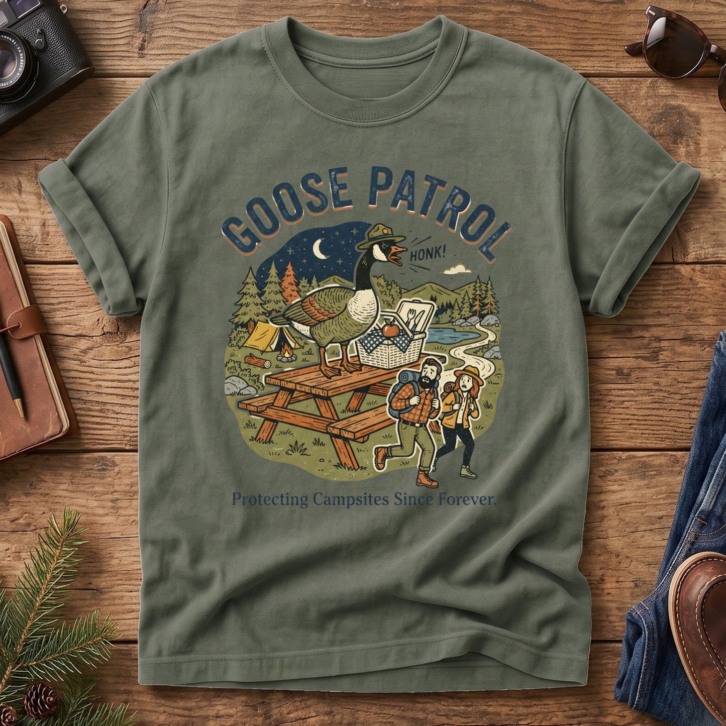 Goose Patrol Tee – styled flat lay, funny goose campsite graphic