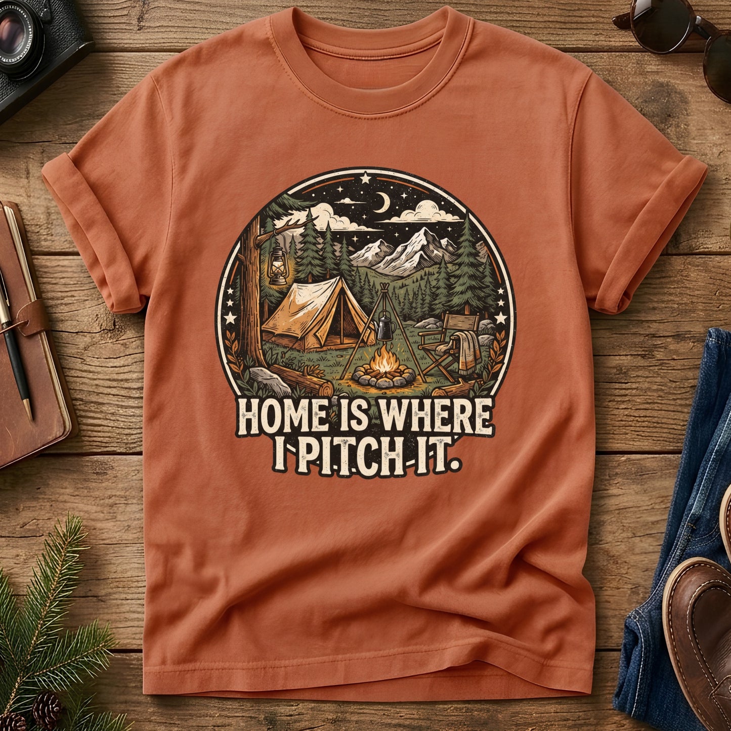 Pitch It Tee – tent, lantern, and campfire night sky badge graphic on Comfort Colors 1717 tee, flat lay