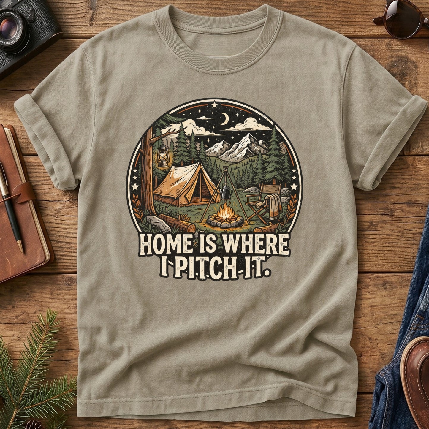 Pitch It Tee – tent, lantern, and campfire night sky badge graphic on Comfort Colors 1717 tee, flat lay