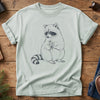 Raccoon Wilderness Tee in Bay — hand-sketched raccoon holding a wildflower