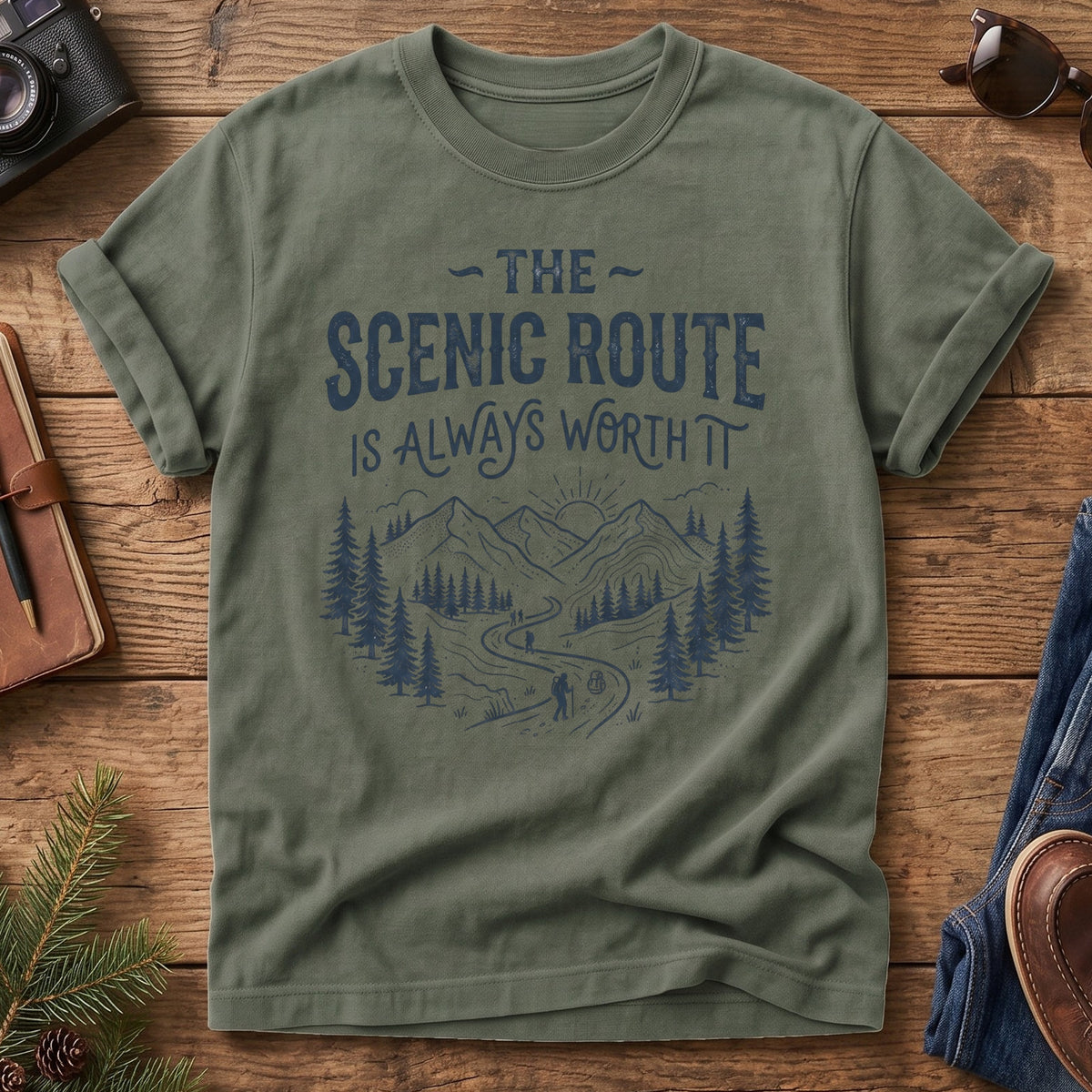 The Scenic Route Is Always Worth It Tee – hiker on winding mountain trail graphic close-up on Comfort Colors 1717 tee