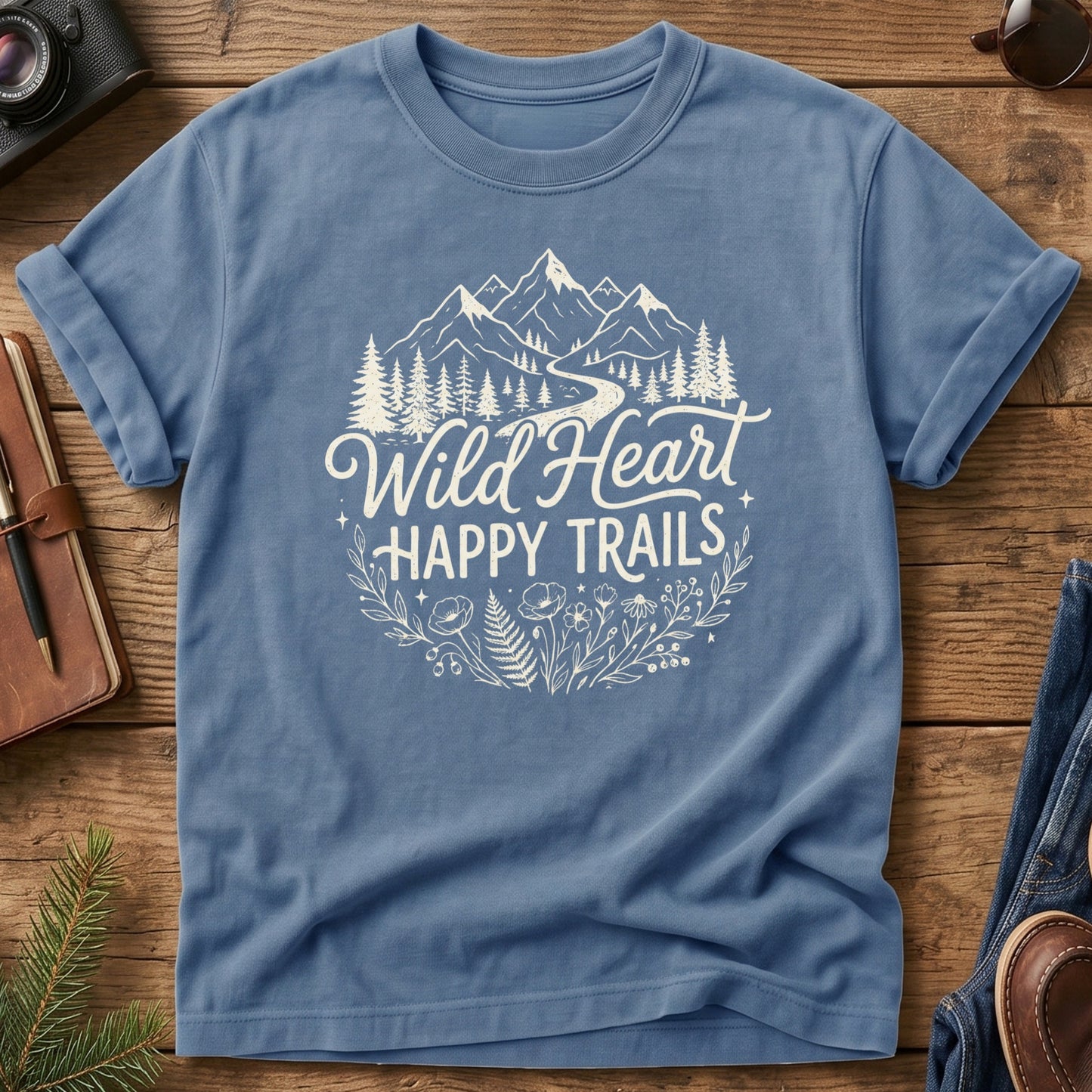 Wild Heart Happy Trails Tee in Blue Jean — mountain and wildflower graphic