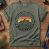 Wilderness Sunset Mountain Tee – folded flat lay of garment-dyed Comfort Colors fabric